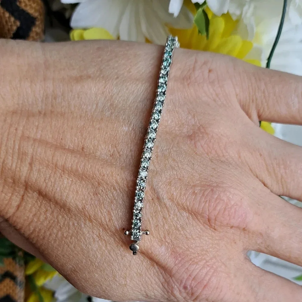Genuine Blue Moissanite Tennis Bracelet In 925 Sterling Silver.